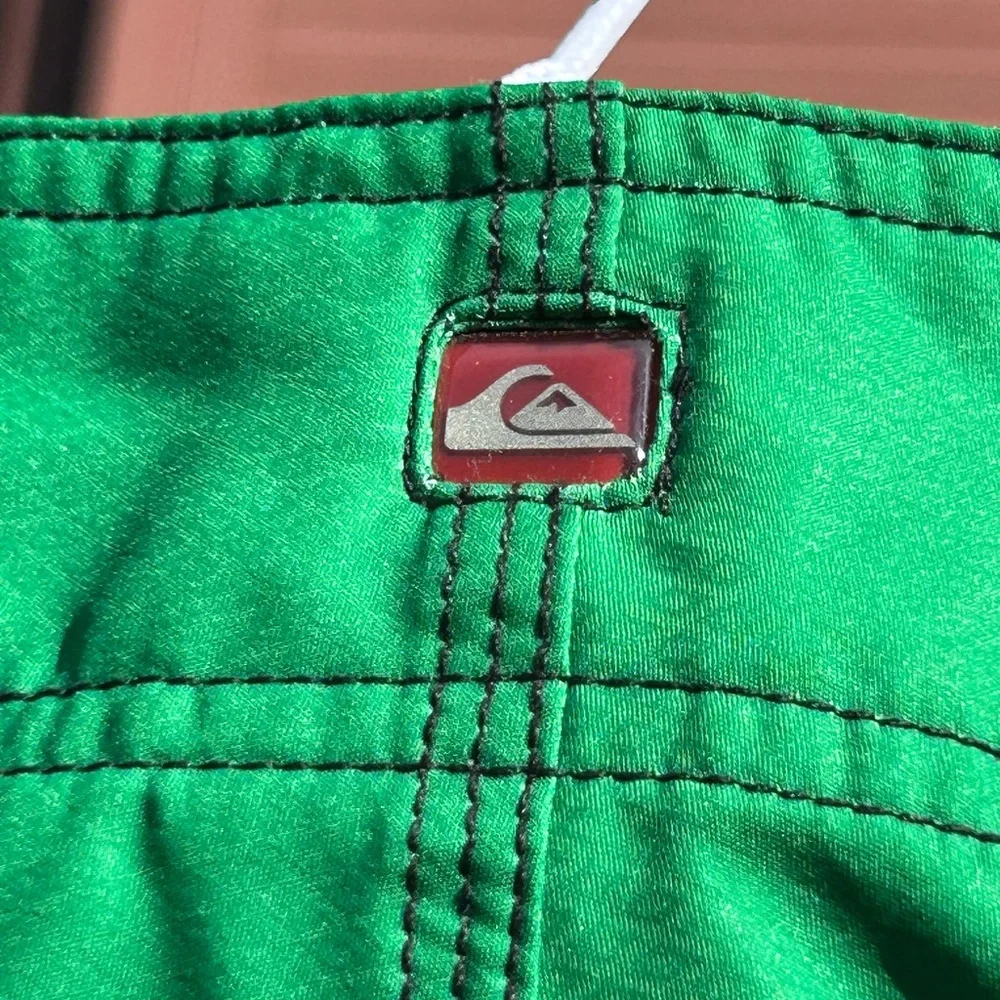 Quiksilver Green Fighting Irish Boardshorts with White Accents